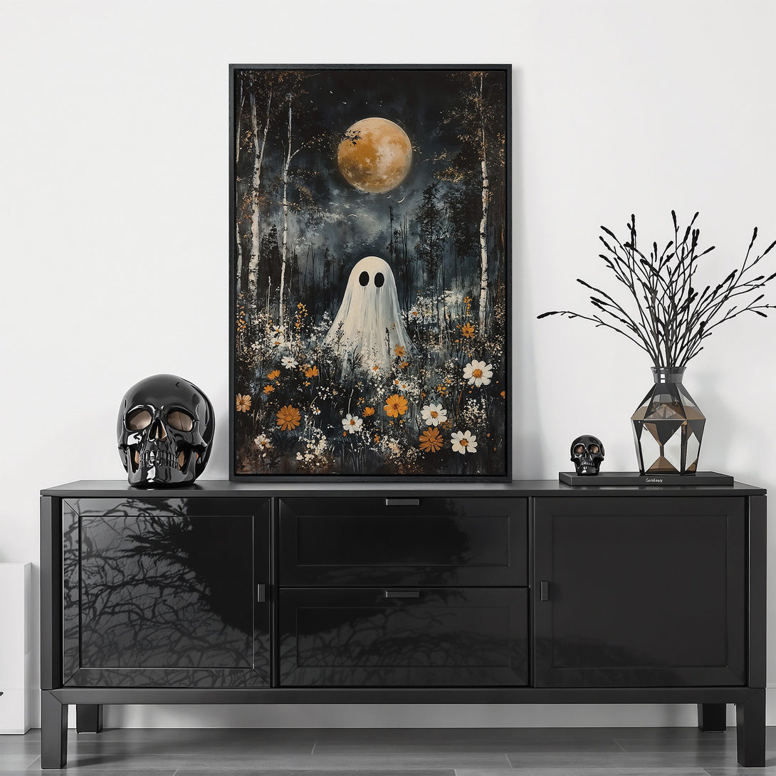 Framed Wall Art featuring a whimsical ghost in a moonlit forest, with a dark, moody color palette. Perfect for Halloween decor!