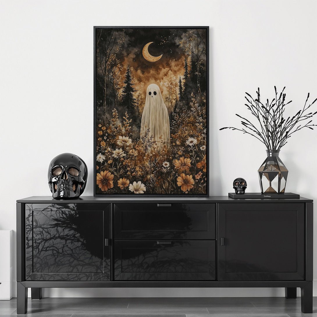 Framed Wall Art featuring a whimsical ghost in a forest scene. Moody, autumnal color palette with browns, oranges, and blacks. Perfect for Halloween decor!
