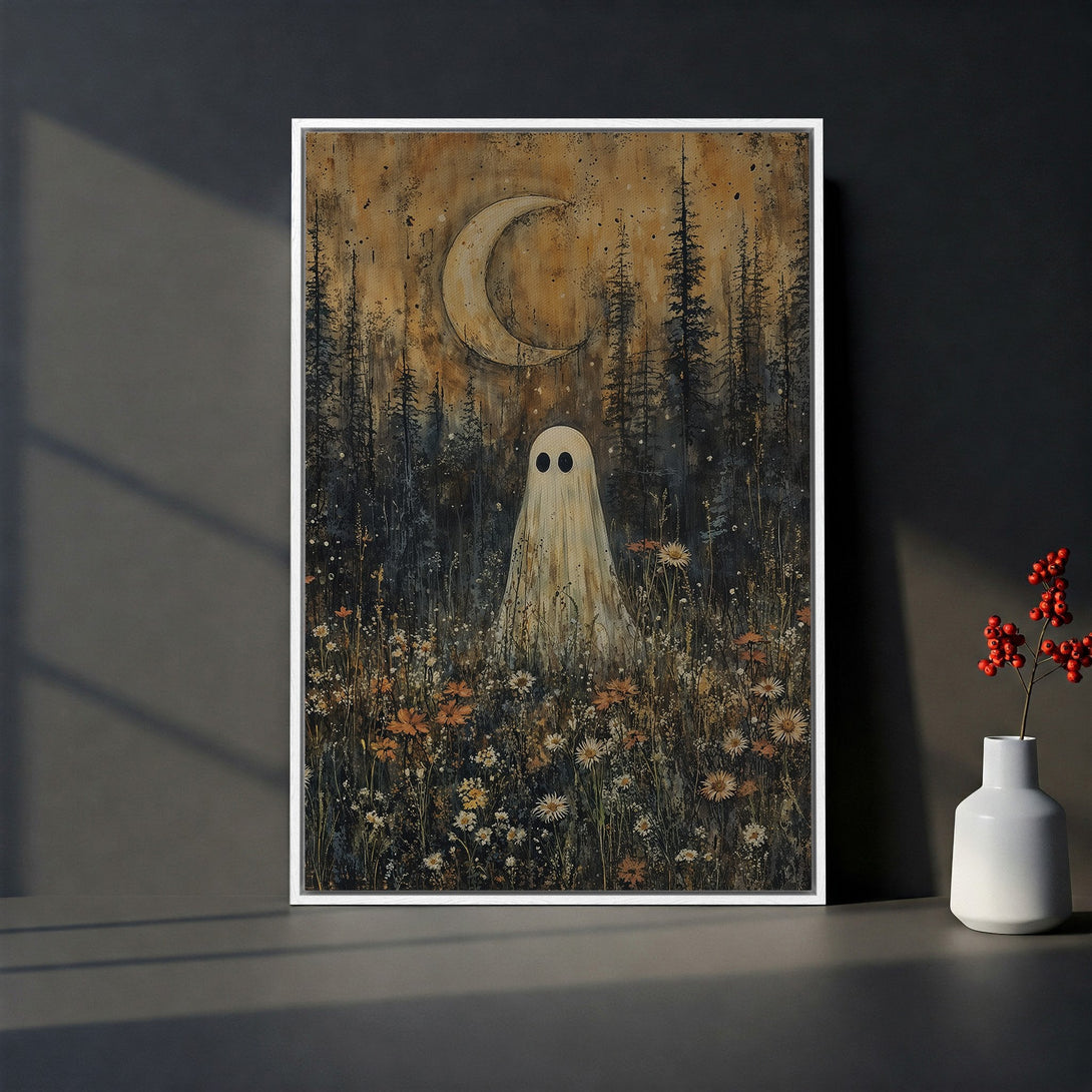 Framed Wall Art featuring a spooky ghost in a forest scene with a crescent moon. Dark, moody color palette with a touch of whimsy. Perfect Halloween decor!
