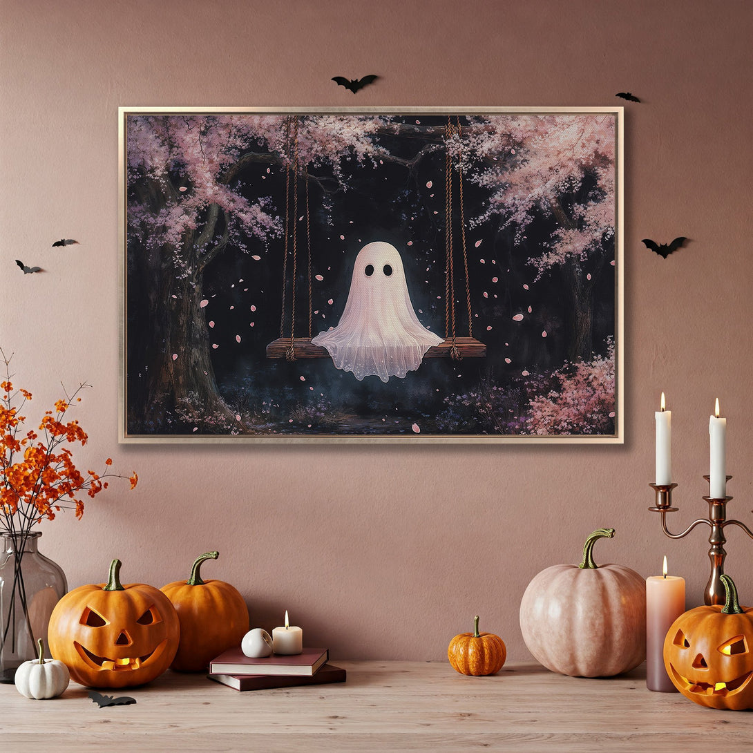 Framed Wall Art: Whimsical ghost on a swing in a pink cherry blossom forest. Perfect Halloween home decor. Pastel color palette.
