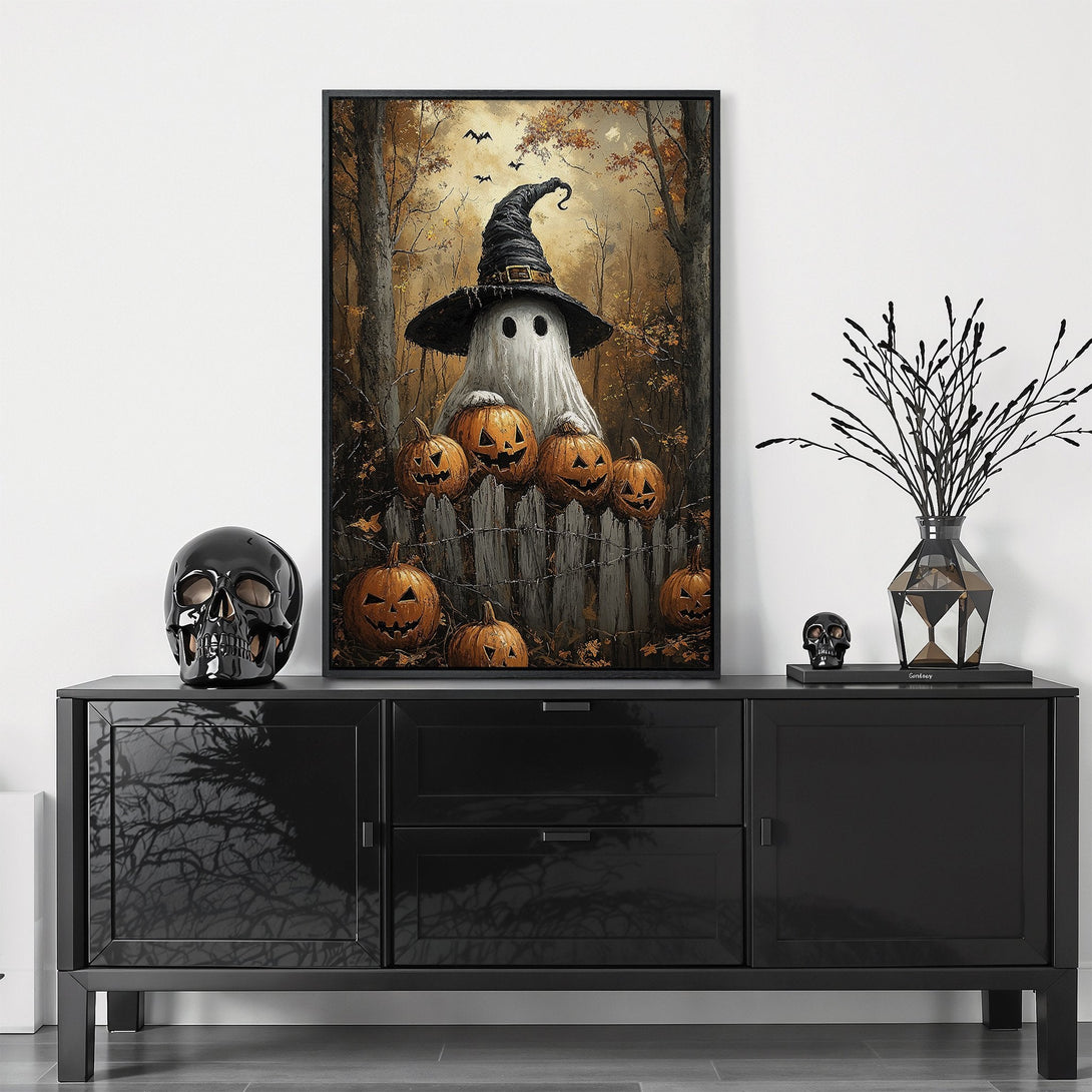 Framed Wall Art: Spooky Halloween scene with a ghost, pumpkins, and witch hat. Warm autumn color palette adds a festive touch to any space.