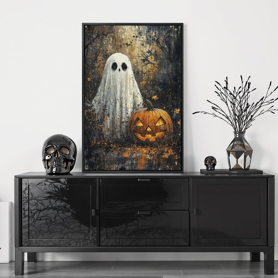 Framed Wall Art featuring a spooky ghost and pumpkin in a dark, painterly style. Moody color palette with orange, black, and white. Perfect Halloween decor!