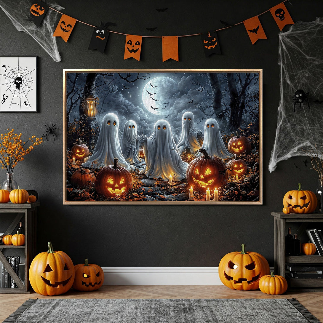 Framed Wall Art: Spooky Halloween scene with ghosts, pumpkins, and a full moon. Dark, moody color palette perfect for fall decor.