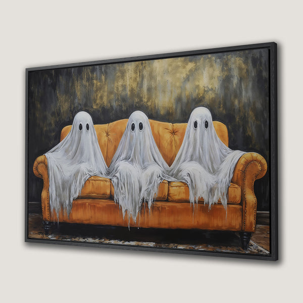 Framed Wall Art: Funny ghost art on a yellow couch. Whimsical canvas print with a black, gold, and orange color palette. Perfect for Halloween decor.