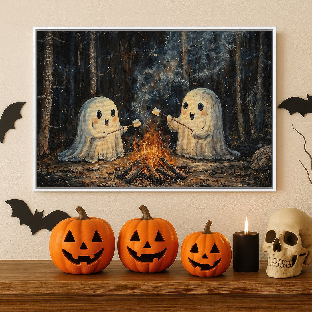 Framed Wall Art: Adorable ghosts roasting marshmallows by a campfire in a whimsical, dark forest. Halloween decor with warm orange and cool blue tones.