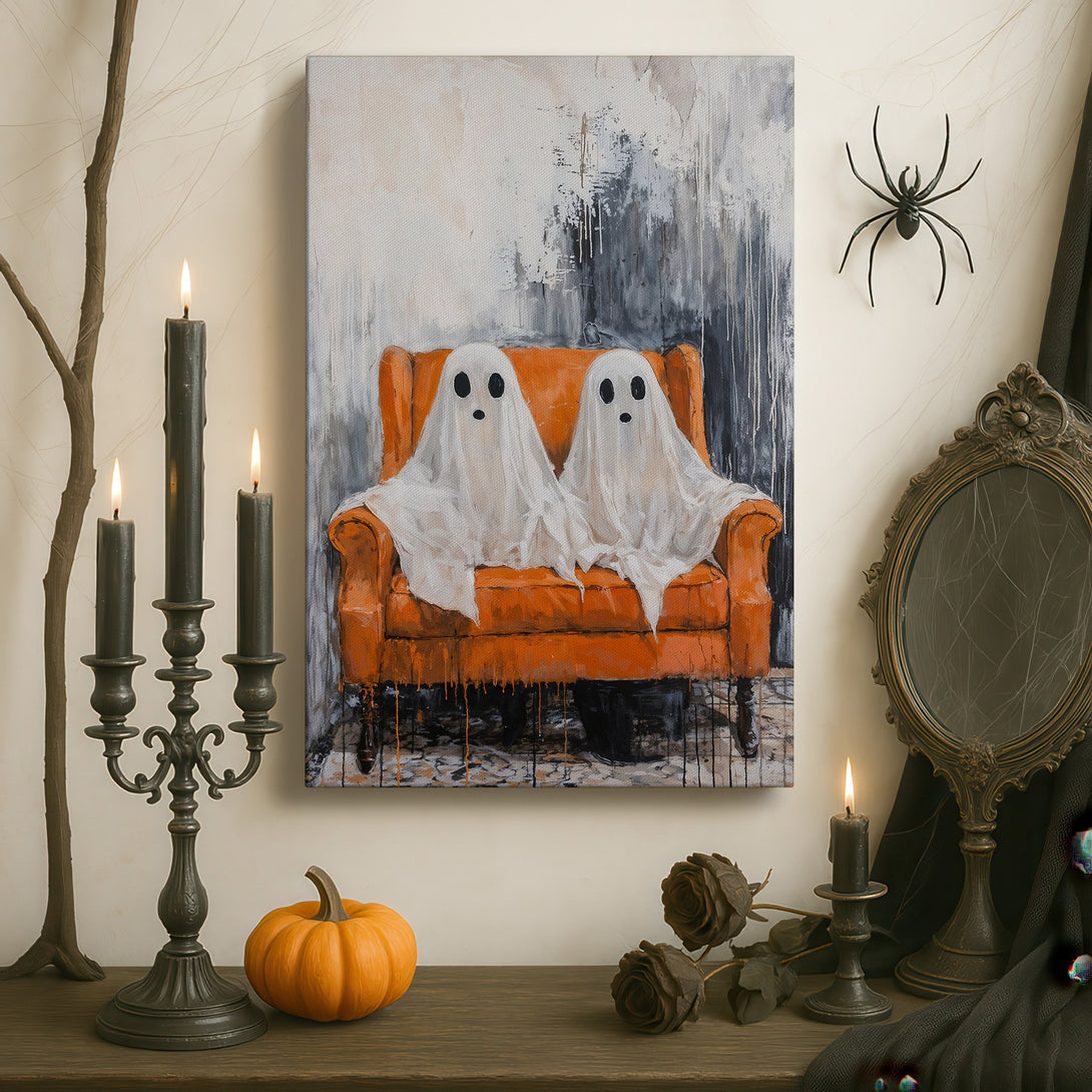 Framed Wall Art: Whimsical ghost painting in a gold frame. Modern abstract style with a neutral and orange color palette. Perfect for Halloween decor!