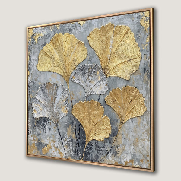 Framed Wall Art: Abstract ginkgo leaf art in gold, silver, and gray. Modern canvas print for stylish home decor.