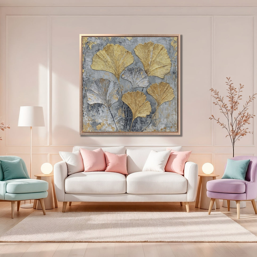 Framed Wall Art featuring gold ginkgo leaves on a gray textured background. Modern, elegant design with a soft, neutral color palette. Perfect for living room decor.