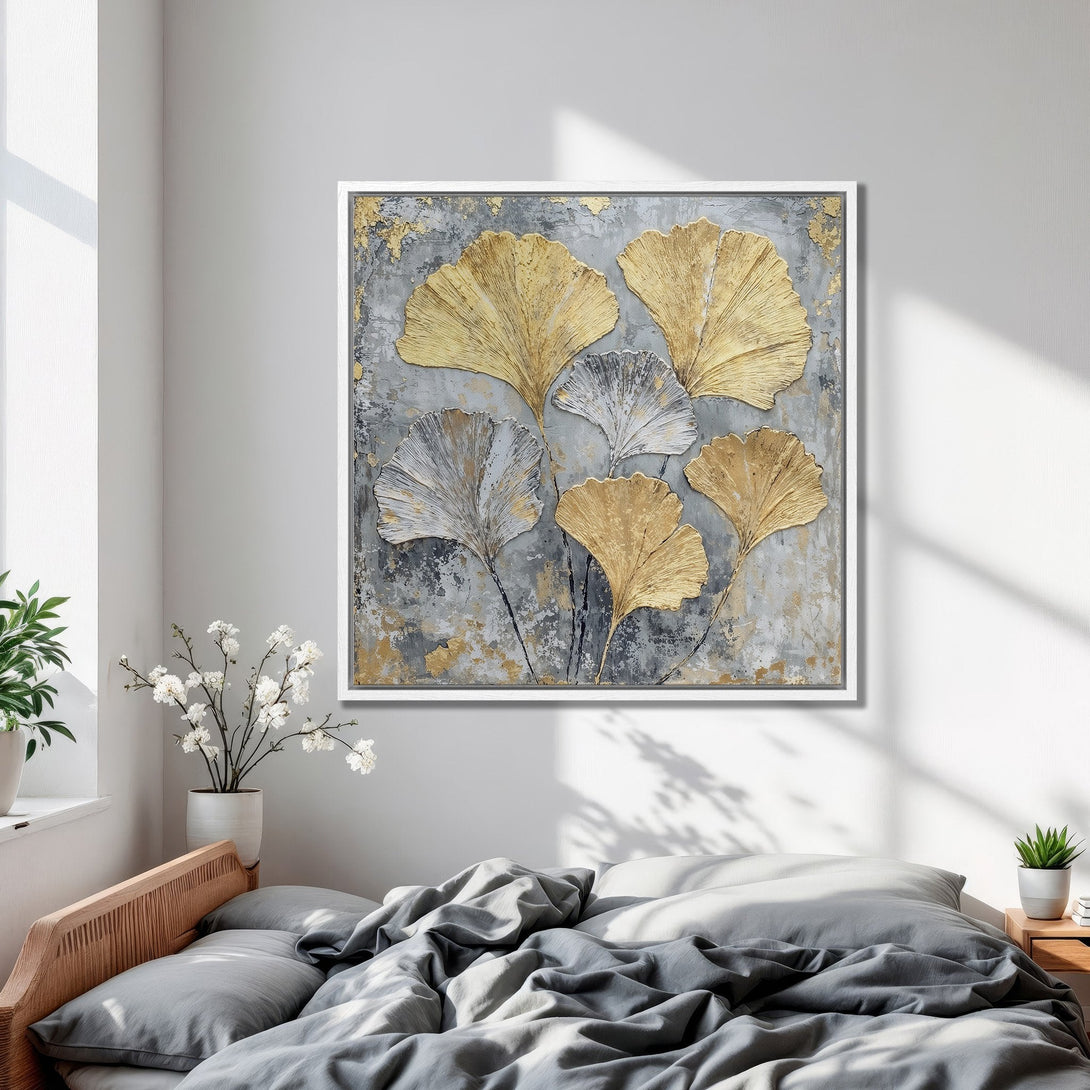 Framed Wall Art: Abstract gold leaf design in a modern bedroom. Neutral gray and gold color palette adds a touch of elegance. Shop now!