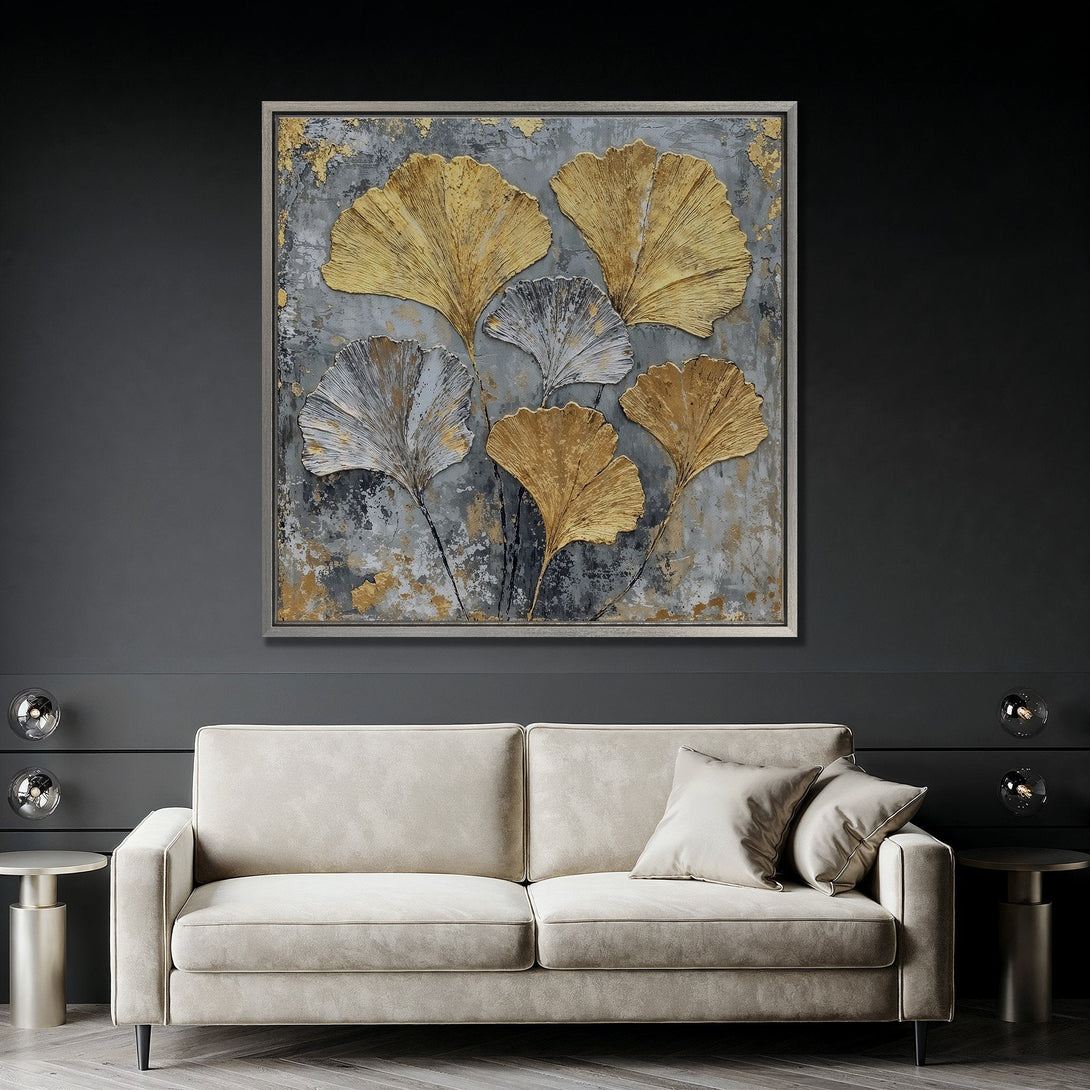 Framed Wall Art: Abstract gold and silver ginkgo leaf design on a textured gray background. Modern, elegant decor with a neutral color palette.