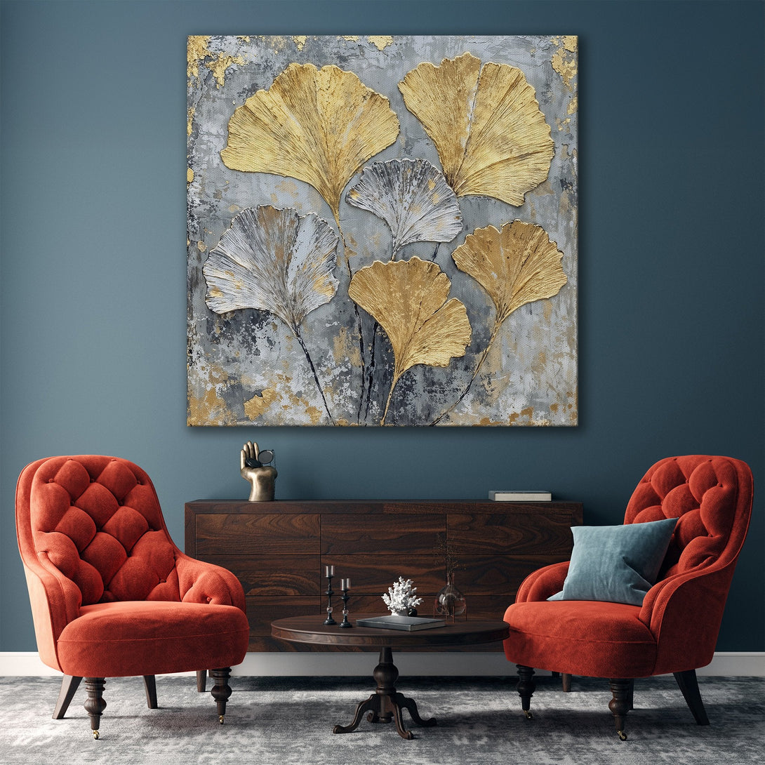 Framed Wall Art featuring gold ginkgo leaves on a gray textured background. Modern, elegant decor in a neutral color palette. Perfect for living room inspiration.