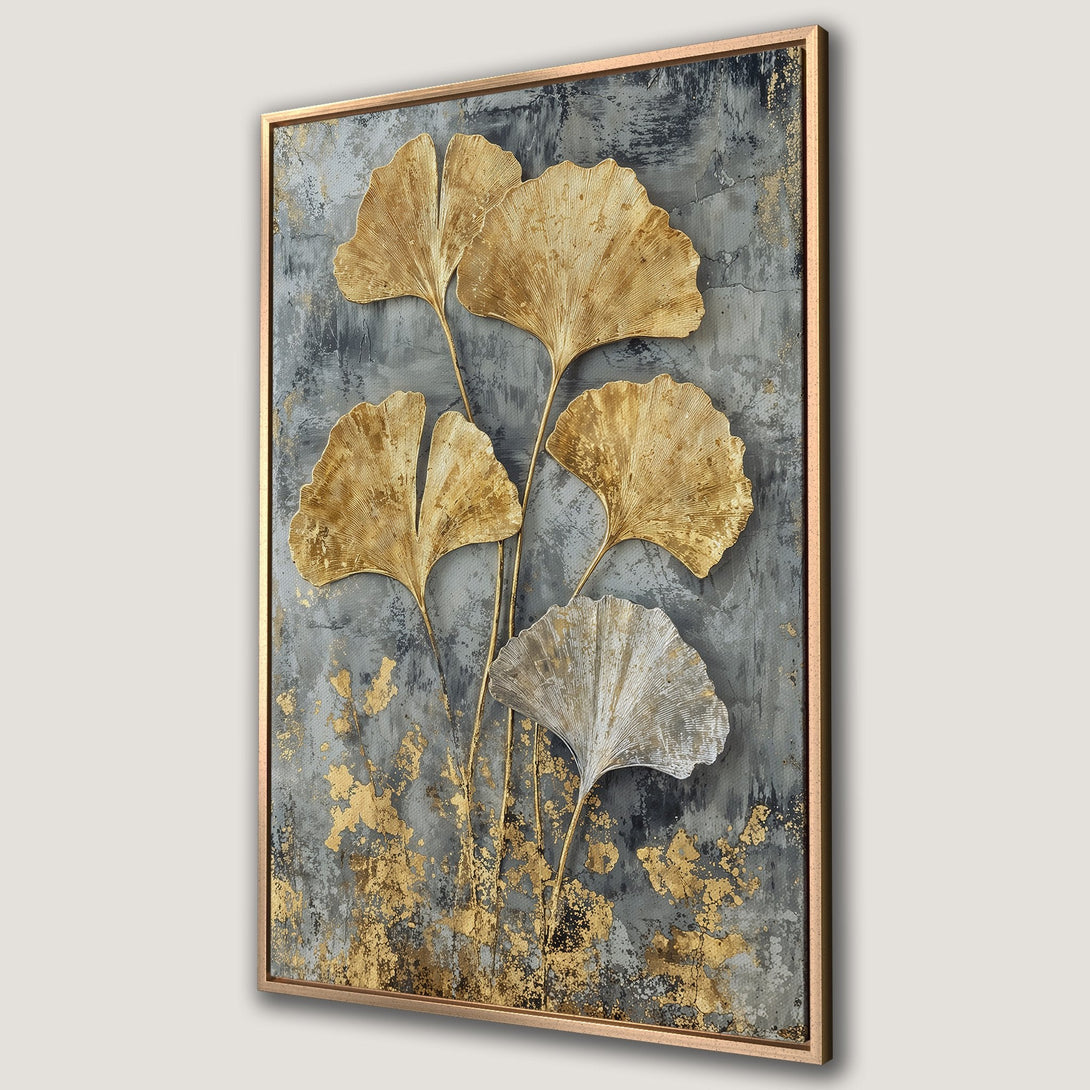 Framed Wall Art featuring gold ginkgo leaves on a textured gray background. Modern, elegant canvas print with a metallic gold and neutral color palette.