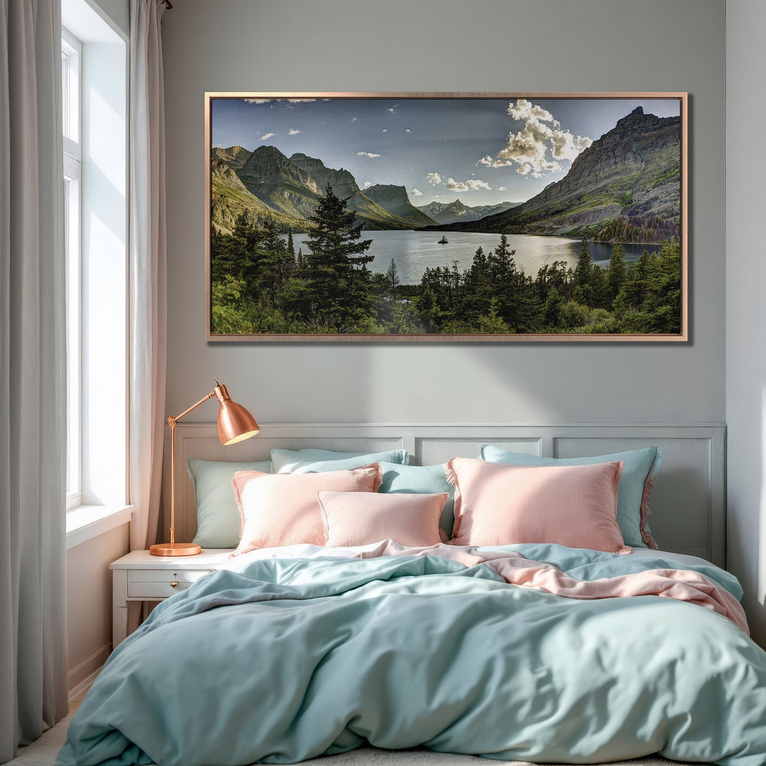 Framed Wall Art featuring a serene mountain lake landscape in a bedroom. Earthy tones with blue, green, and pink accents create a calming atmosphere.