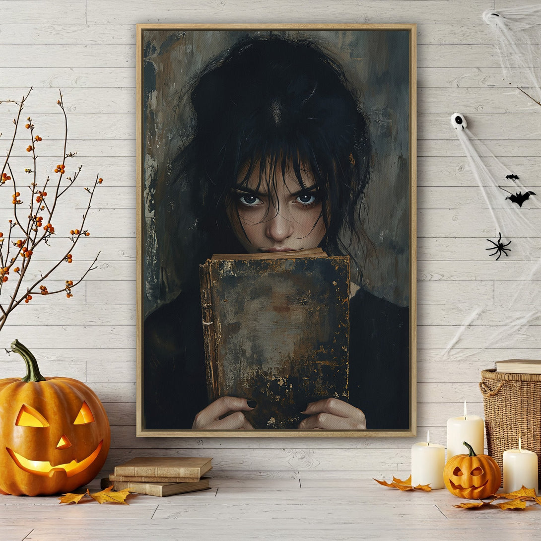 Framed Wall Art featuring a mysterious woman with dark hair and a book, in a moody, dark color palette. Perfect Halloween decor!