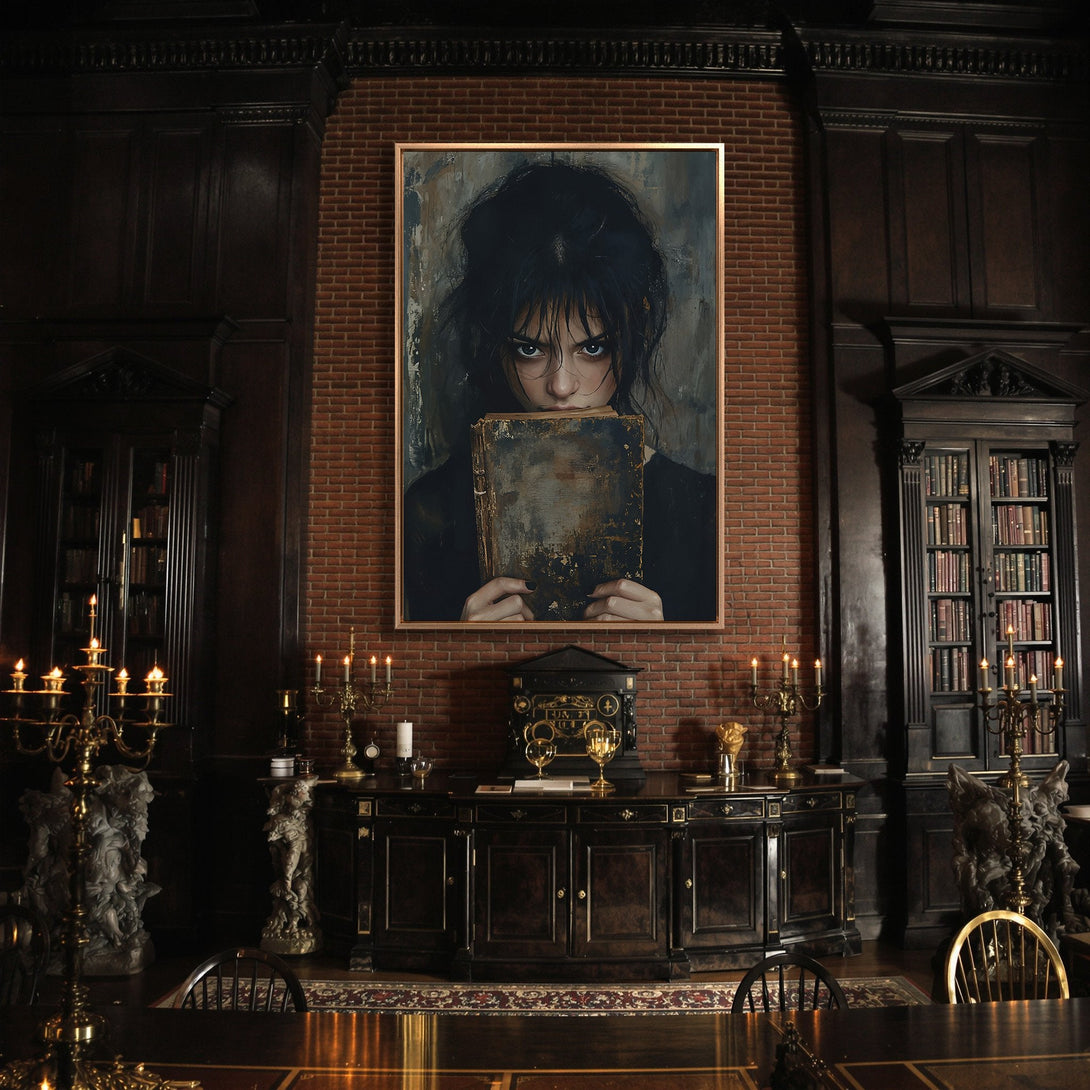 Framed Wall Art featuring a dark portrait of a woman with a book, displayed in a moody, gothic-style interior with a warm, dark color palette.