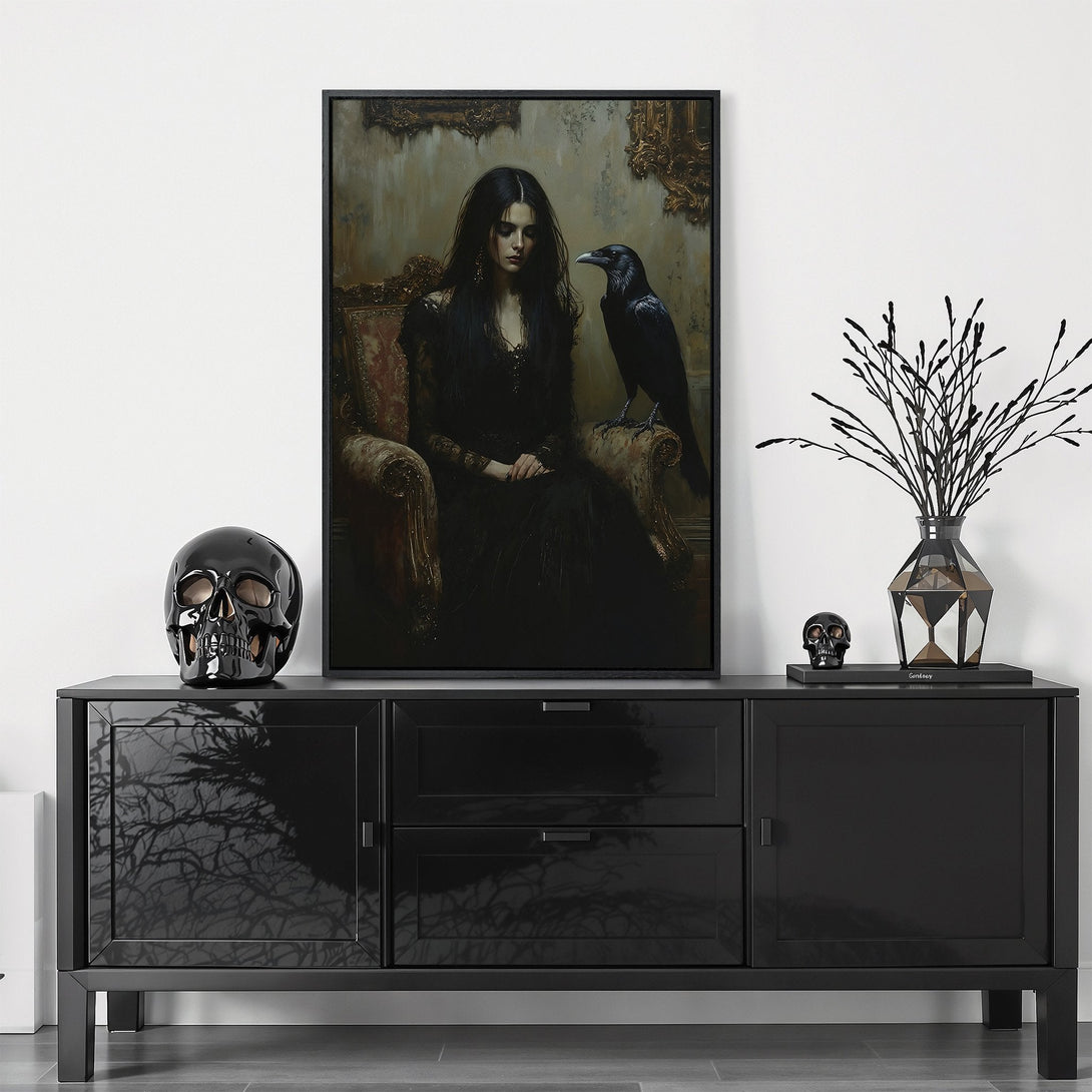 Framed Wall Art featuring a gothic portrait of a woman with a raven, in a dark, moody color palette. Perfect for adding a touch of mystery.