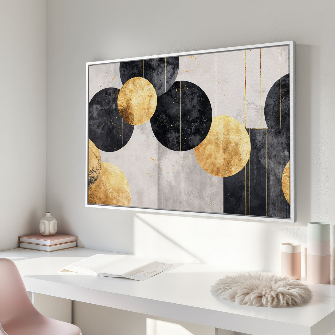 Framed Wall Art featuring abstract gold and black circles. Modern art print for home decor. Neutral color palette.