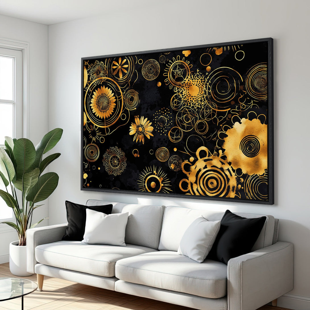 Framed Wall Art featuring a gold floral design on a black background. Modern, abstract art piece perfect for living room decor. Luxurious gold and black color palette.