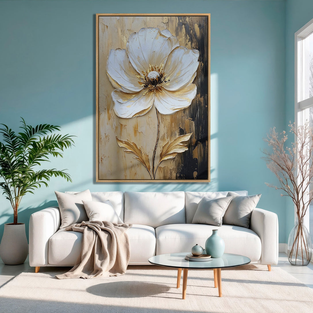 Framed Wall Art: Large white flower canvas print in a modern living room. Gold, beige, and black color palette. Perfect for home decor.