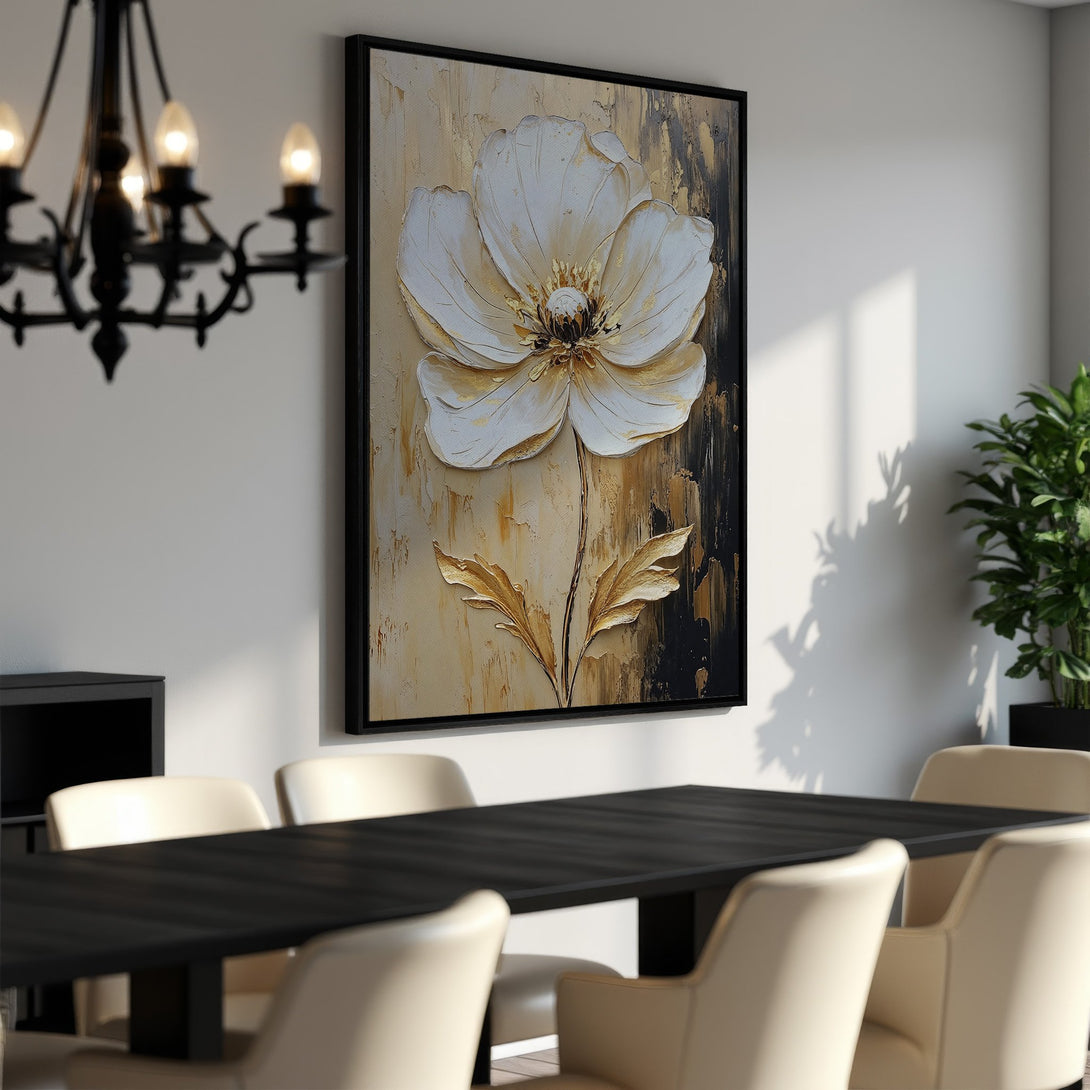 Framed Wall Art featuring a textured white flower painting with gold accents. Elegant canvas print in a neutral color palette, perfect for modern home decor.