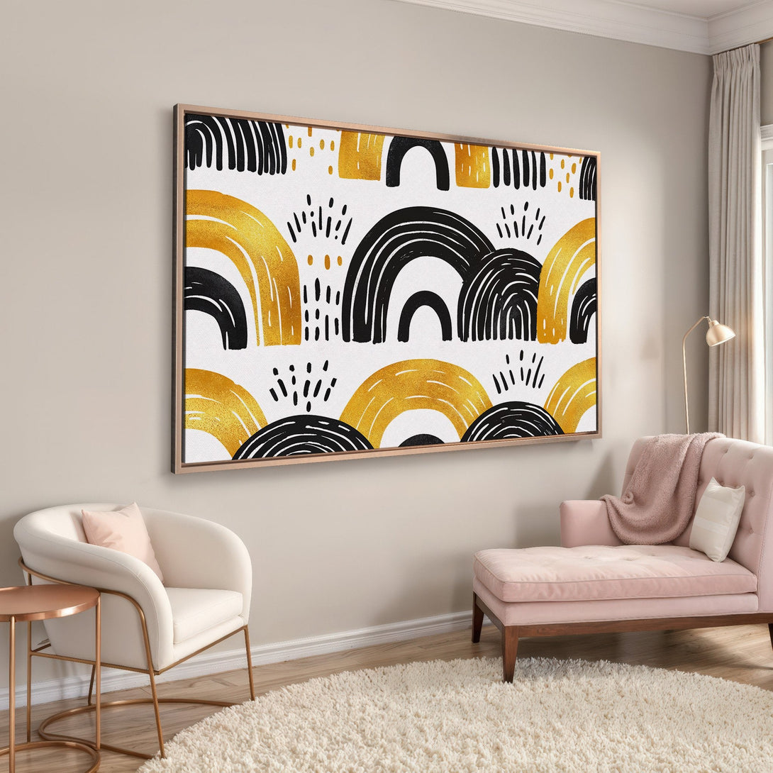 Framed Wall Art featuring a modern abstract design in gold and black on white. Adds a touch of elegance to any interior.