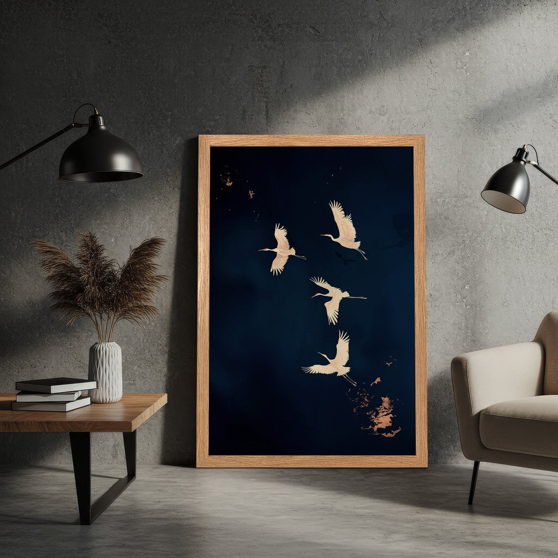 Framed Poster featuring elegant cranes in flight, modern style, navy and gold color palette. Elevate your space with this art print!