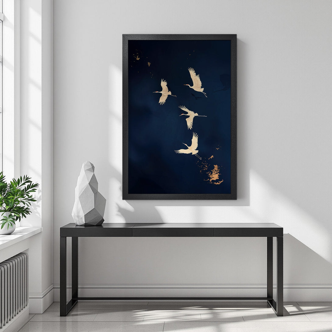 Framed Poster featuring elegant cranes in flight, a minimalist style with a dark blue and gold color palette. Perfect wall art!