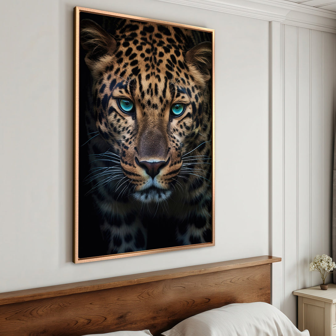 Framed Wall Art: Stunning leopard portrait with piercing blue eyes. Dramatic, modern style with warm brown and cool blue tones. Elevate your space with this captivating canvas print.
