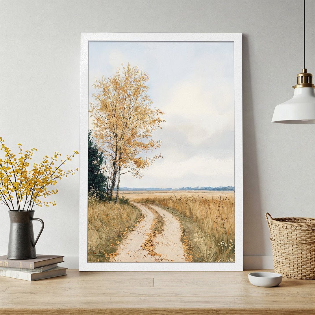 Framed Poster of a serene landscape with a dirt road, autumn trees, and a muted color palette. Perfect wall art for any home!