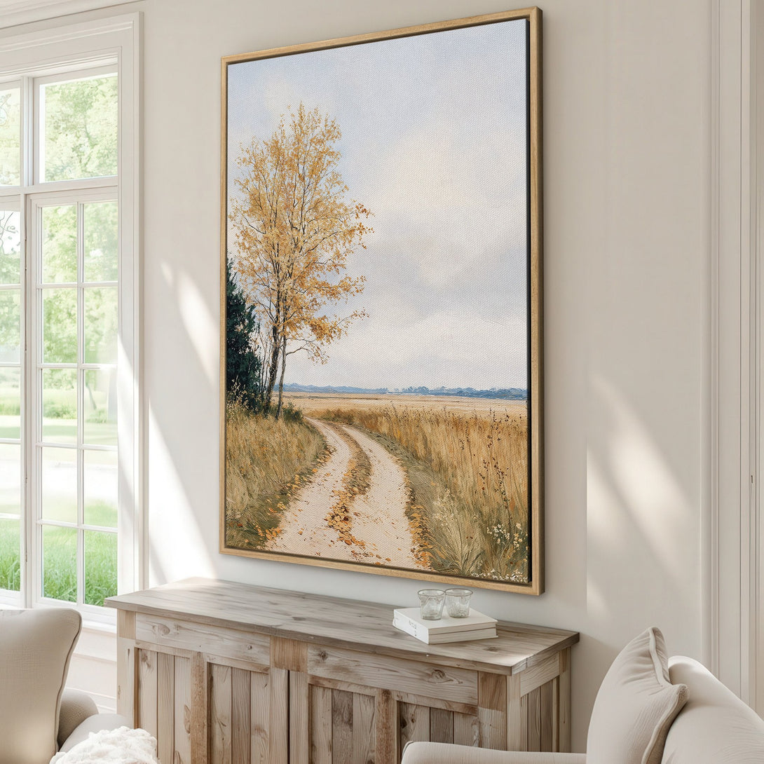 Framed Wall Art featuring a serene landscape painting with a dirt road and autumn trees, in a warm, neutral color palette. Perfect for adding a touch of nature to your home!