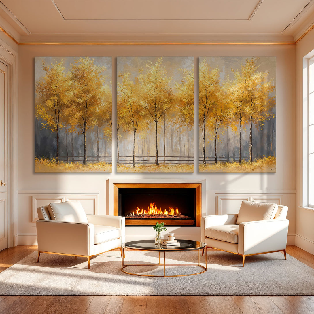 Canvas Print of golden autumn trees in a triptych, displayed above a fireplace. Warm, inviting color palette with yellow, gray, and beige tones.