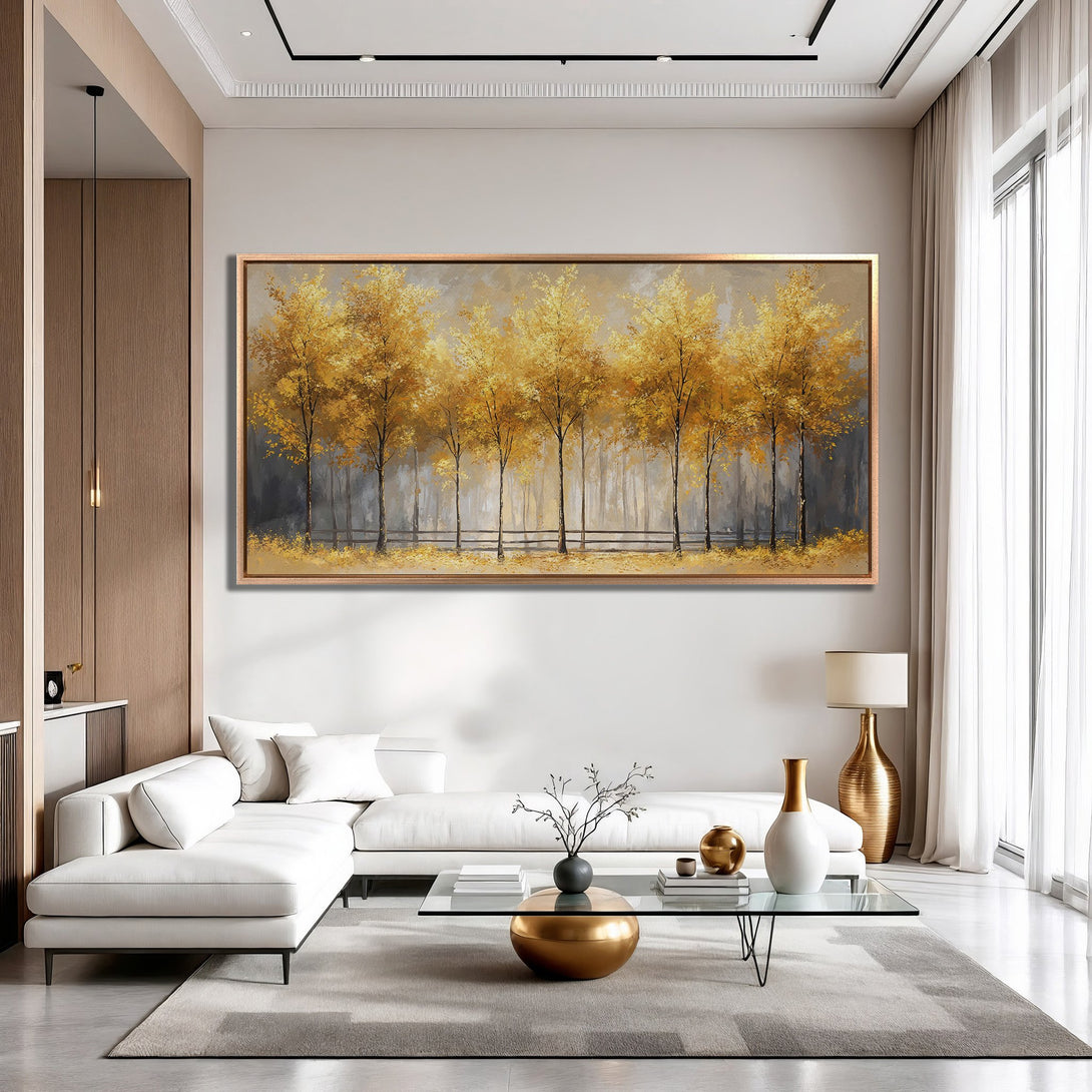 Framed Wall Art featuring a golden autumn forest scene. Modern style with warm yellow and neutral color palette, perfect for living room decor.