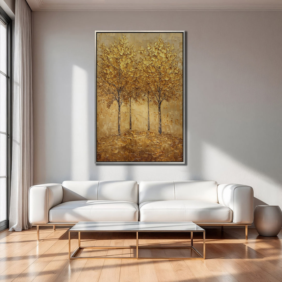Framed Wall Art: Gold textured tree painting, adding warmth to a modern living room. Earthy tones and a touch of elegance for your home decor.