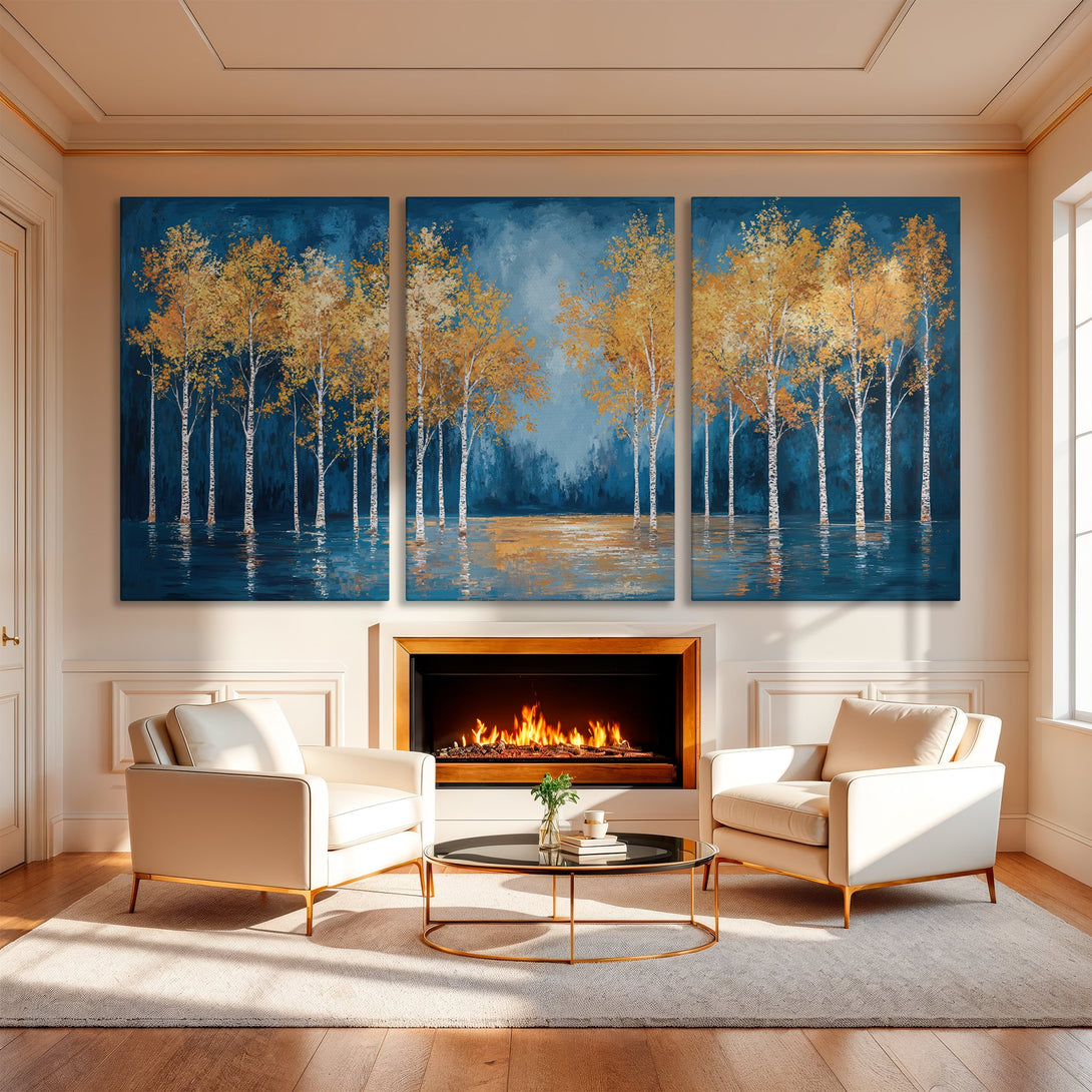 Canvas Print of golden birch trees in a blue and gold color palette, displayed above a fireplace. Modern abstract art for home decor.