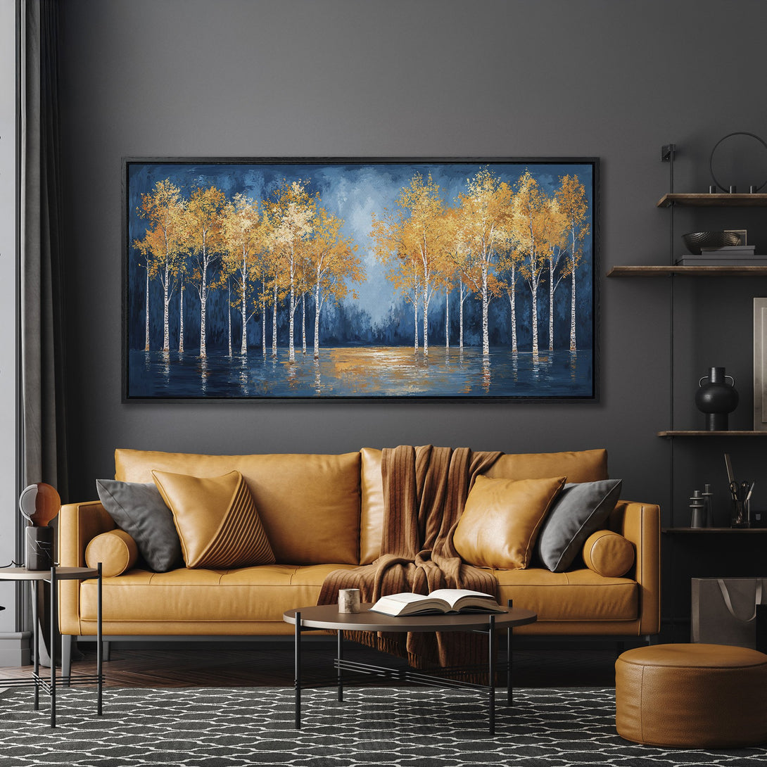 Framed Wall Art featuring a serene landscape of golden trees against a blue backdrop. Modern style with a warm, inviting color palette. Perfect for living room decor.