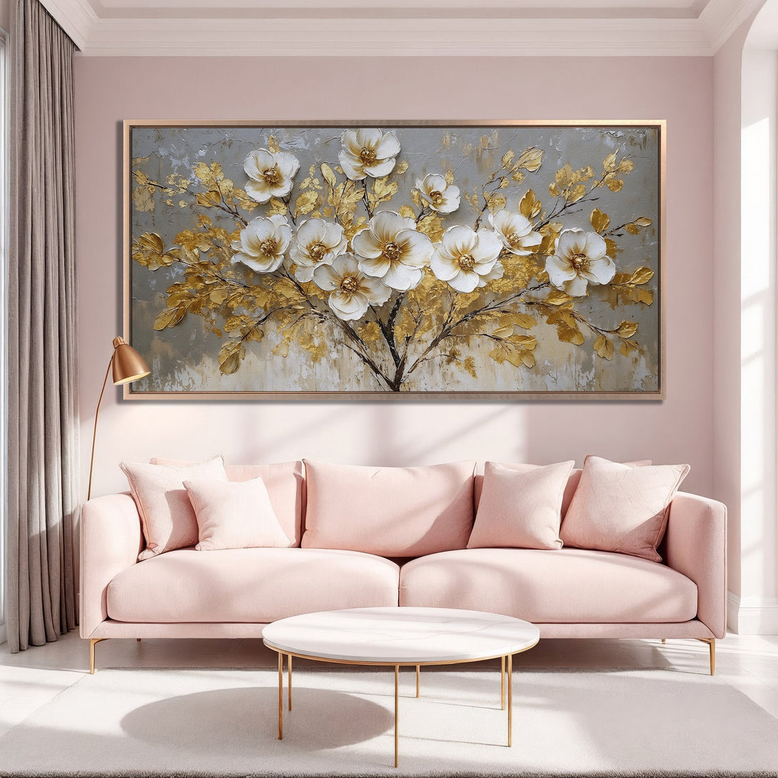 Framed Wall Art: Elegant floral artwork in gold and white tones, displayed in a stylish pink interior. Perfect for adding a touch of luxury.