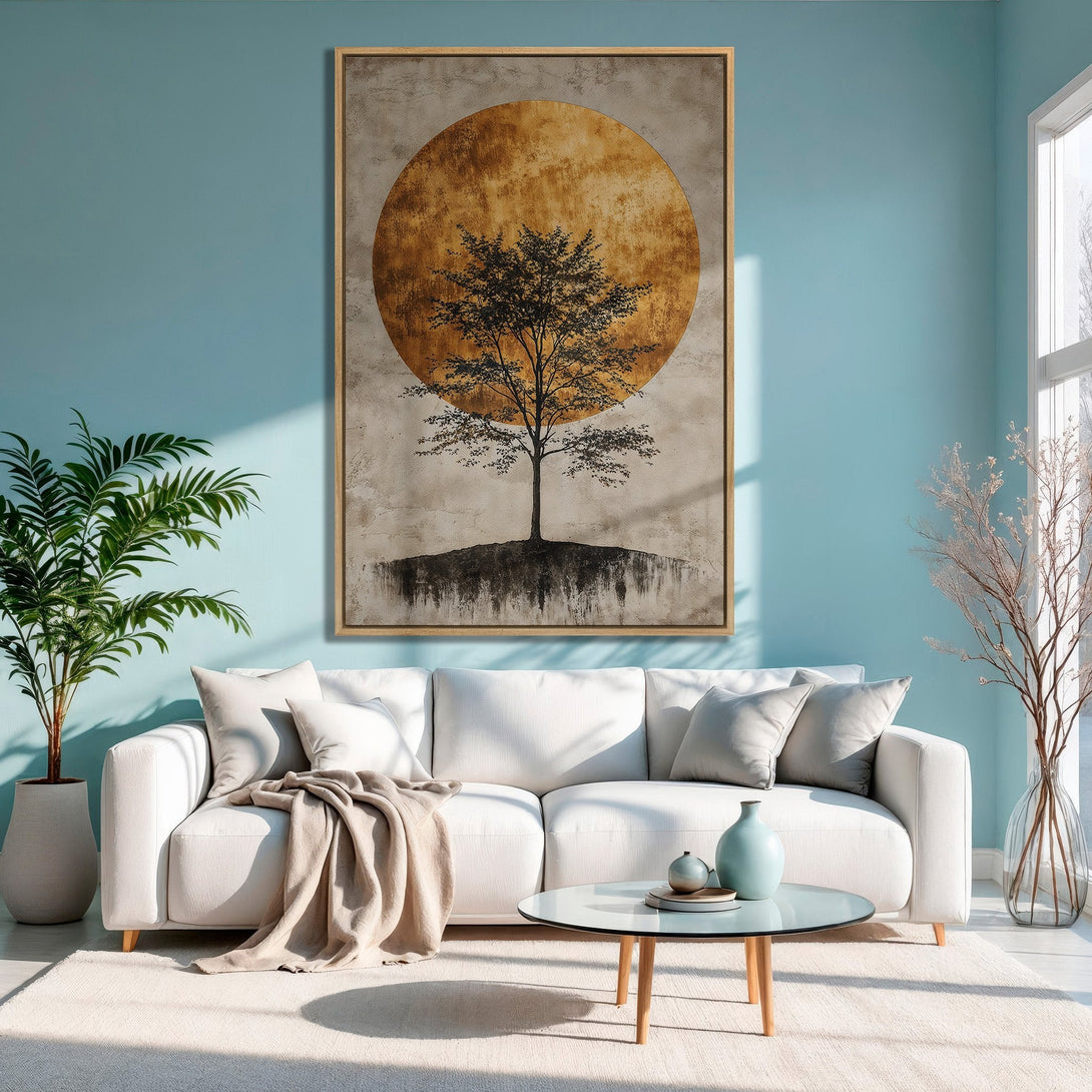 Framed Wall Art featuring a serene tree silhouette against a golden sun. Adds a touch of zen with its neutral and blue color palette. Perfect for modern interiors.