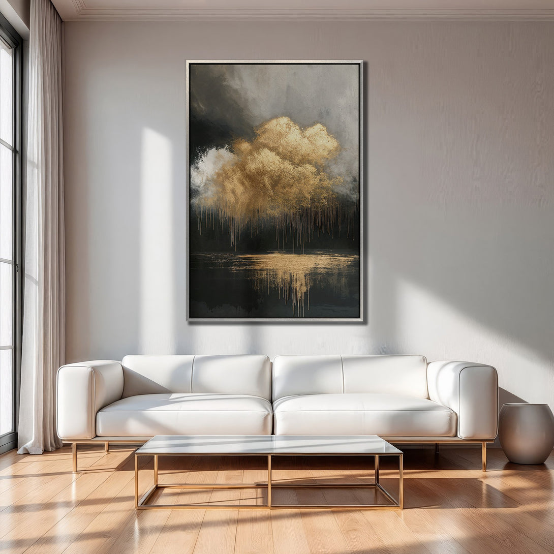Framed Wall Art: Abstract gold cloudscape canvas print in modern living room. Dramatic, moody art with black, gold, and gray color palette.