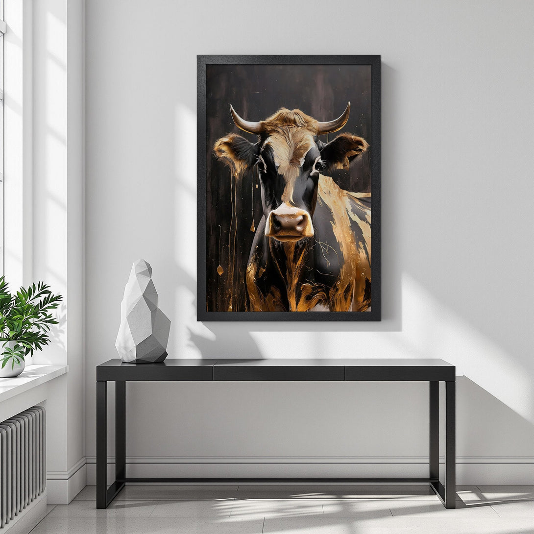 Framed Poster featuring a cow with gold accents. Modern art style, striking black, gold, and neutral palette. Perfect wall decor!