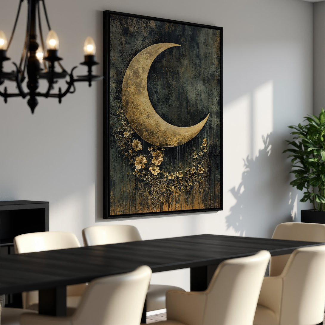 Framed Wall Art featuring a golden crescent moon and floral design. Adds a touch of celestial elegance with a moody, dark teal and gold color palette. Perfect for dining room decor.