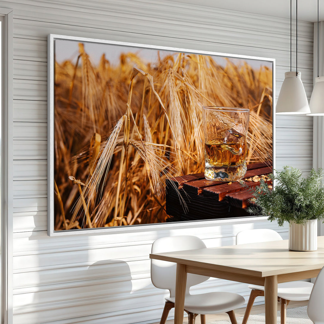 Framed Wall Art: Whiskey & wheat field canvas print. Warm, inviting tones of gold, brown, and amber. Perfect for adding rustic elegance to your home.