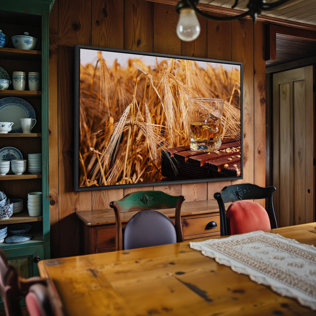 Framed Wall Art: Whiskey & wheat field canvas print. Warm, rustic interior with brown & gold tones. Perfect for a cozy dining room.