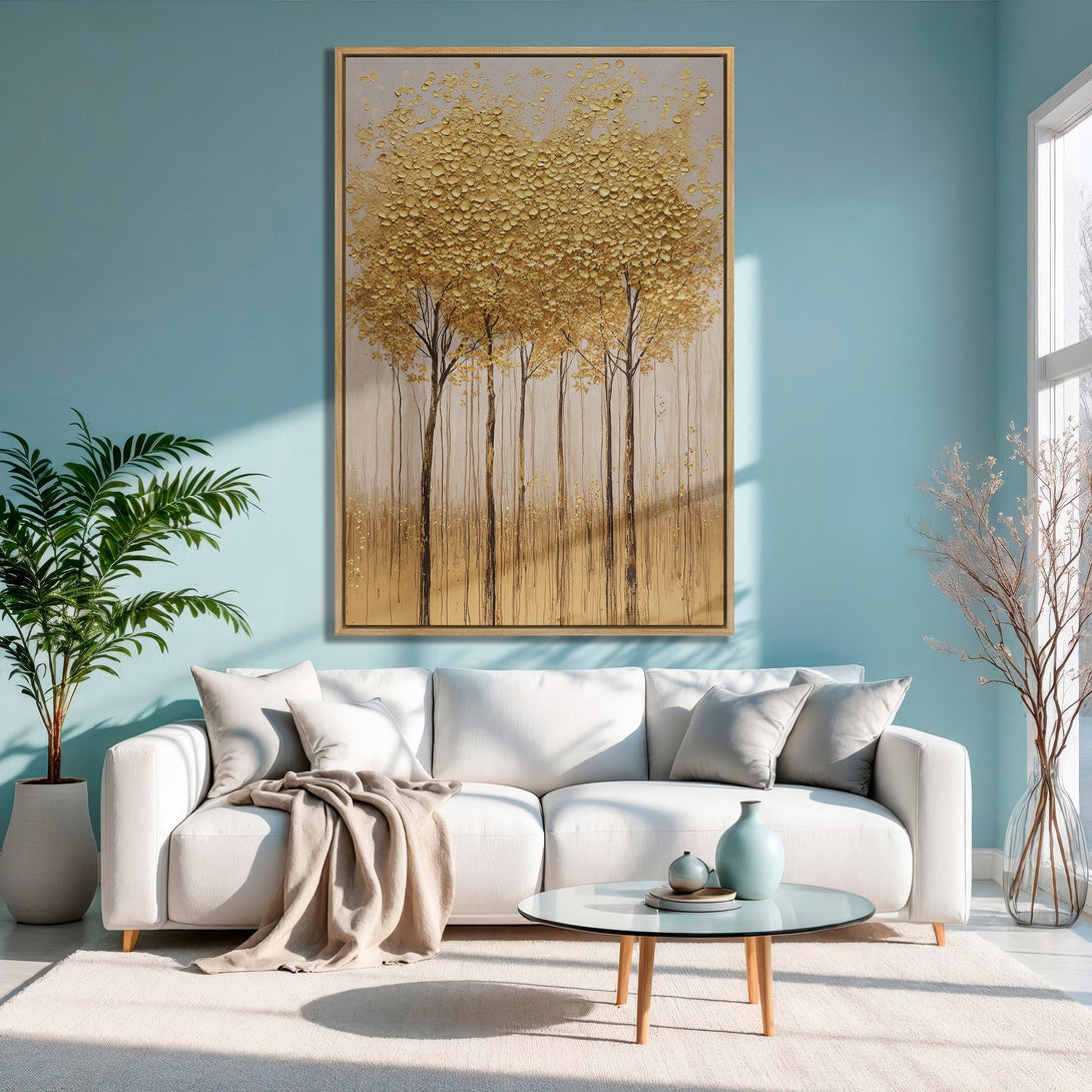 Framed Wall Art: Golden textured tree art print in a modern living room. Warm gold and neutral tones against a teal wall. Elevate your space!