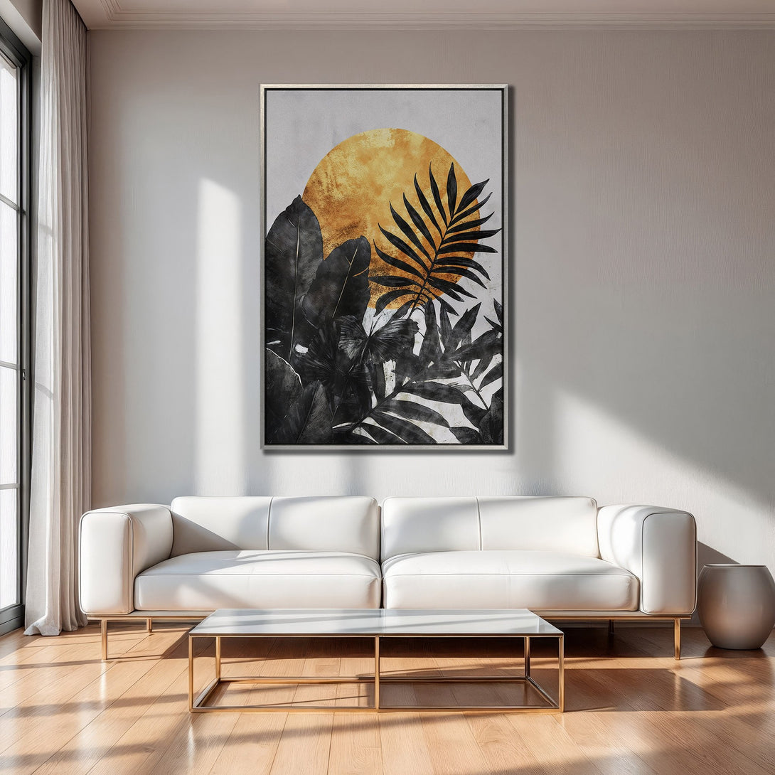 Framed Wall Art featuring a black and gold tropical leaf design. Modern style, neutral color palette, perfect for living room decor.