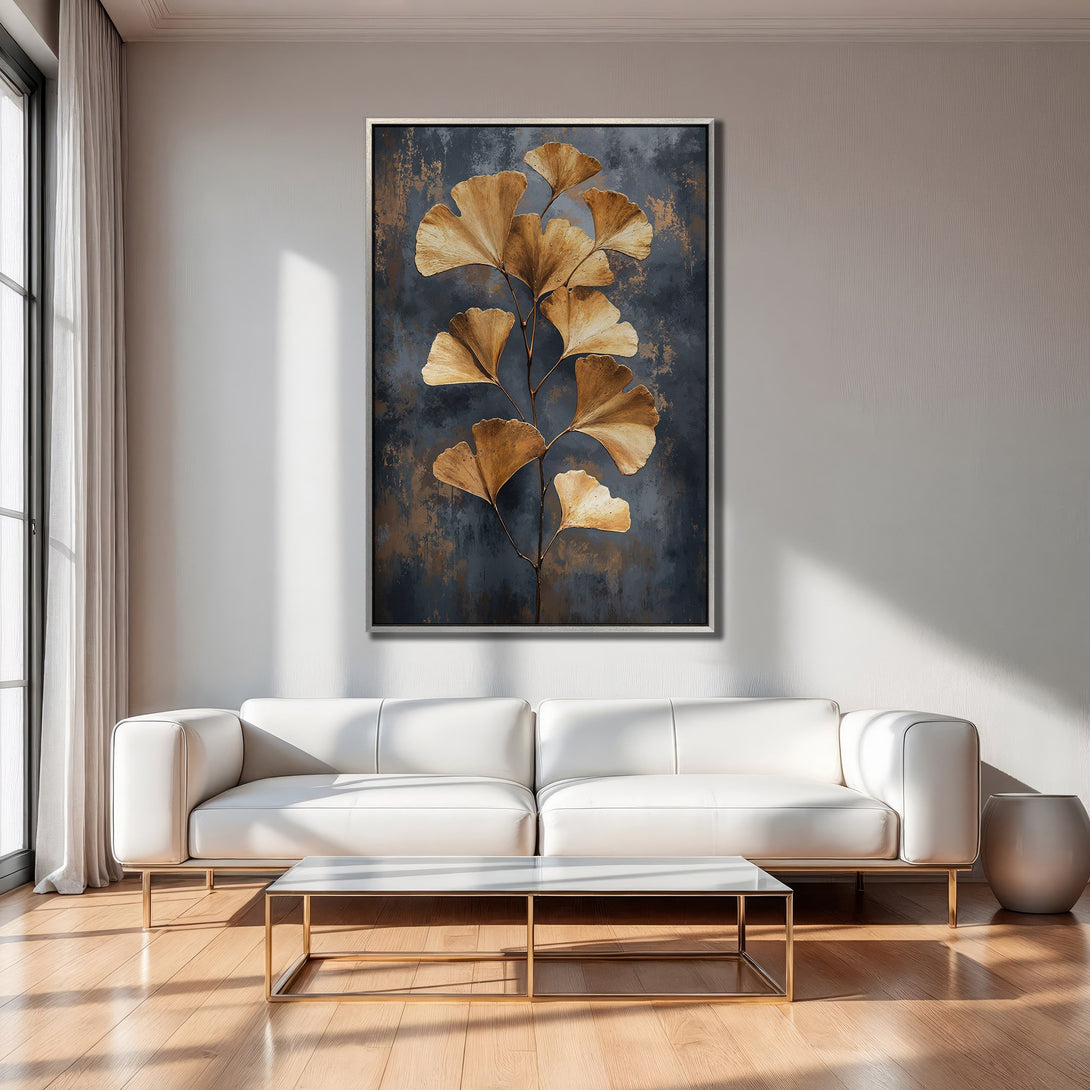Framed Wall Art featuring gold ginkgo leaves on a dark blue background. Modern abstract style, perfect for living room decor.