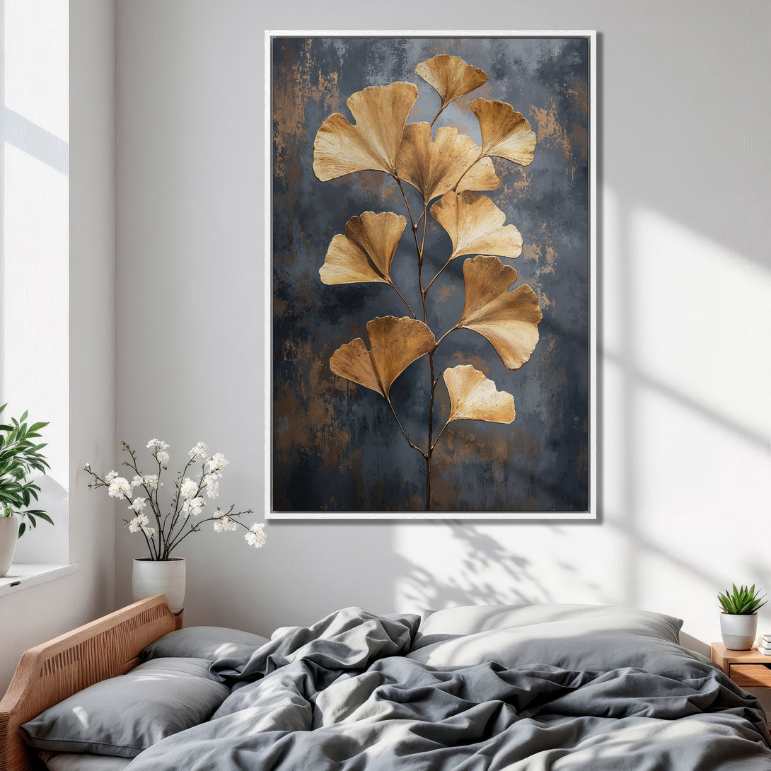 Framed Wall Art featuring golden ginkgo leaves on a textured gray-blue background. Modern, elegant Canvas Print with a warm, neutral color palette.