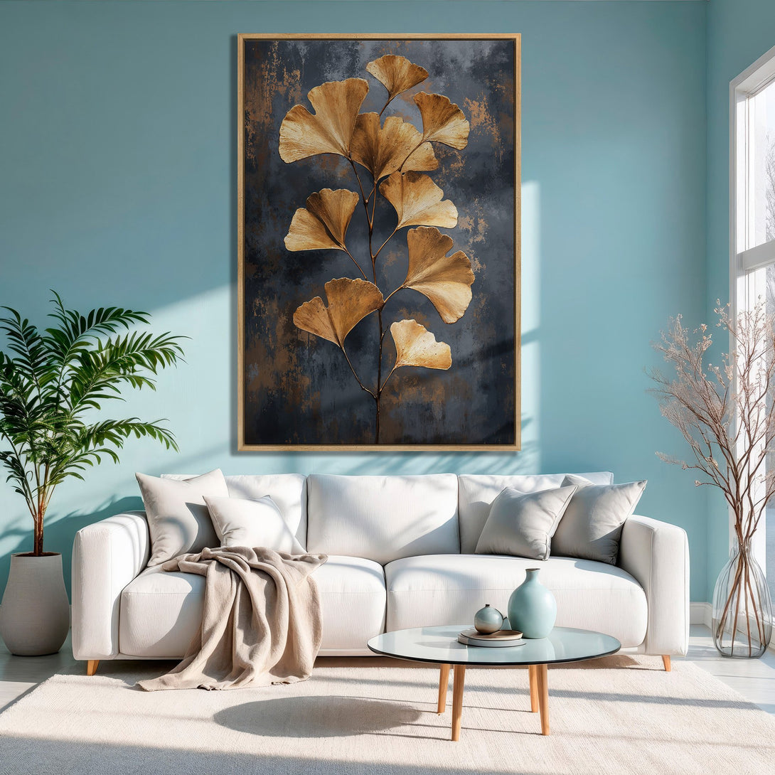 Framed Wall Art featuring gold ginkgo leaves on a dark background. Modern, elegant decor with a neutral and teal color palette. Elevate your living space!