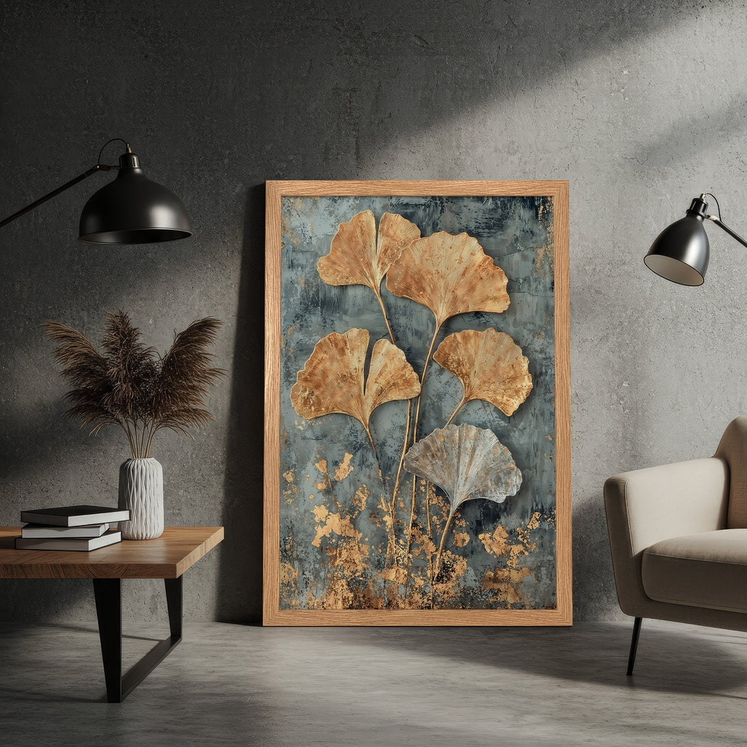 Framed Poster featuring gold ginkgo leaves on a textured blue-grey background. Modern art style with warm, neutral color palette.