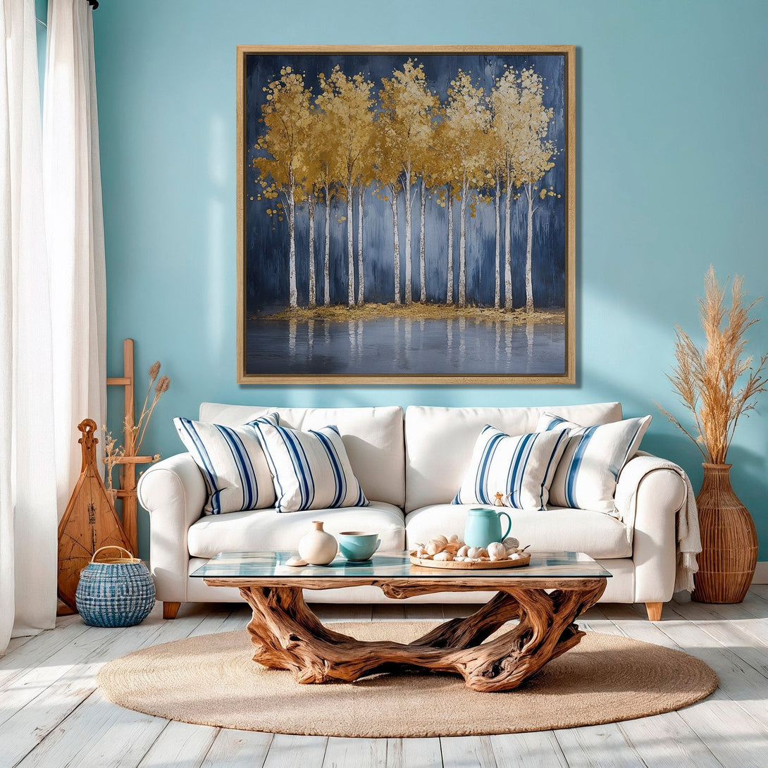 Framed Wall Art featuring golden trees against a dark blue backdrop. Coastal style Canvas Print with a serene, nature-inspired color palette.