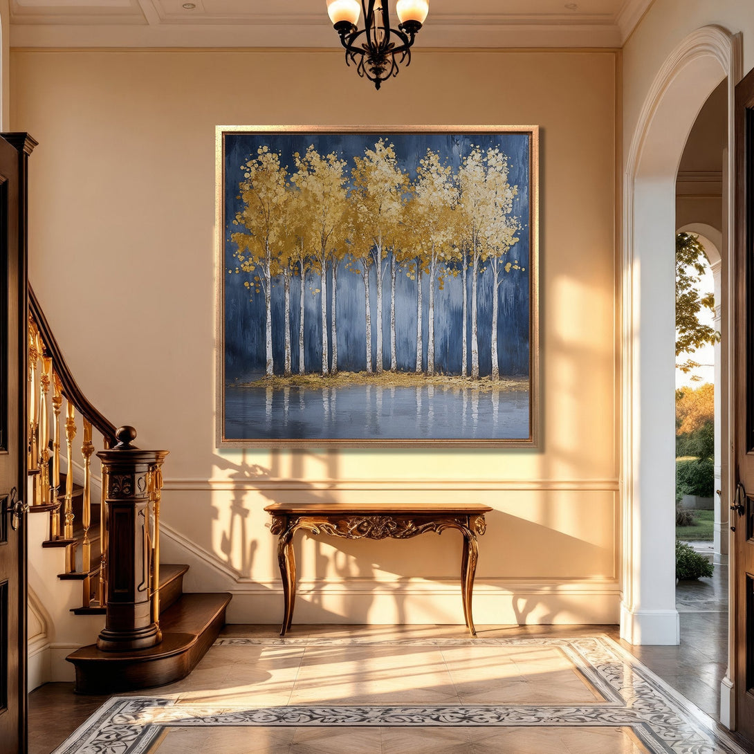 Framed Wall Art: Abstract gold trees on a blue background. Elegant art piece in a luxury interior with a warm, inviting color palette. Perfect for home decor.